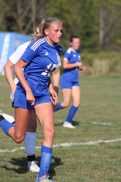 Student Athlete running in blue uniform